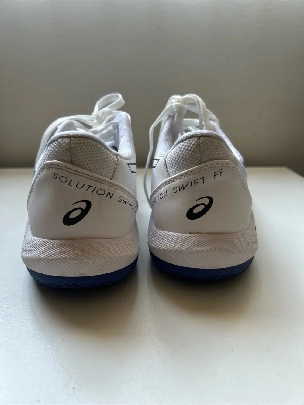 ASICS White Athletic Running Shoes with Blue and Black Accents